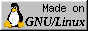 Fat penguin Tux, captioned 'Made on GNU/Linux'