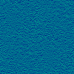 Turquoise wall with a rough pattern embossed into it